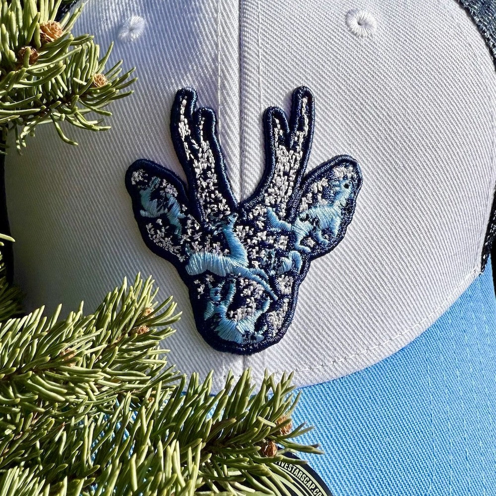 STIRNU BUKS cepure ar saliektu nagu FIVE gaiši zila