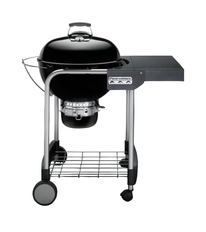 Weber grill with side burner on a white background