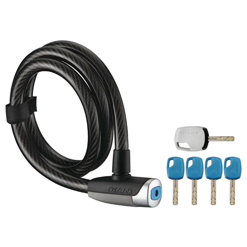 A coiled black steel cable bicycle lock with a black and silver head, shown with four blue key fobs and a small white key on a plain white background. The brand name 'GIANT' is visible on the lock head and one key fob.