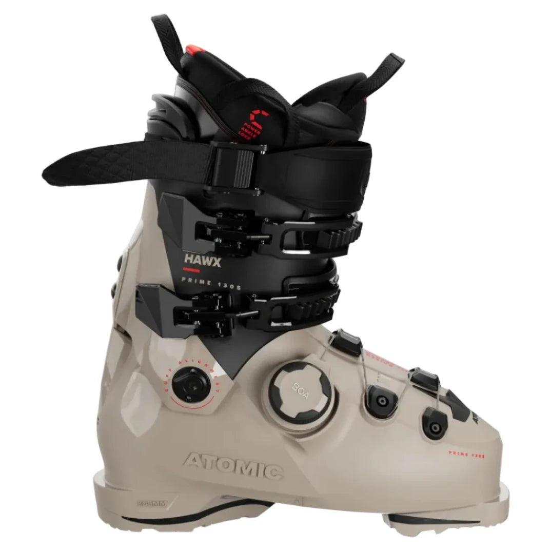 Beige and black Atomic ski boot on a white background