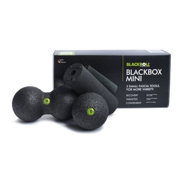 BlackRoll Blackbox Mini foam massage tools including two dumbbell-shaped tools and one cylindrical tool, displayed in front of their black retail packaging box on a white background.