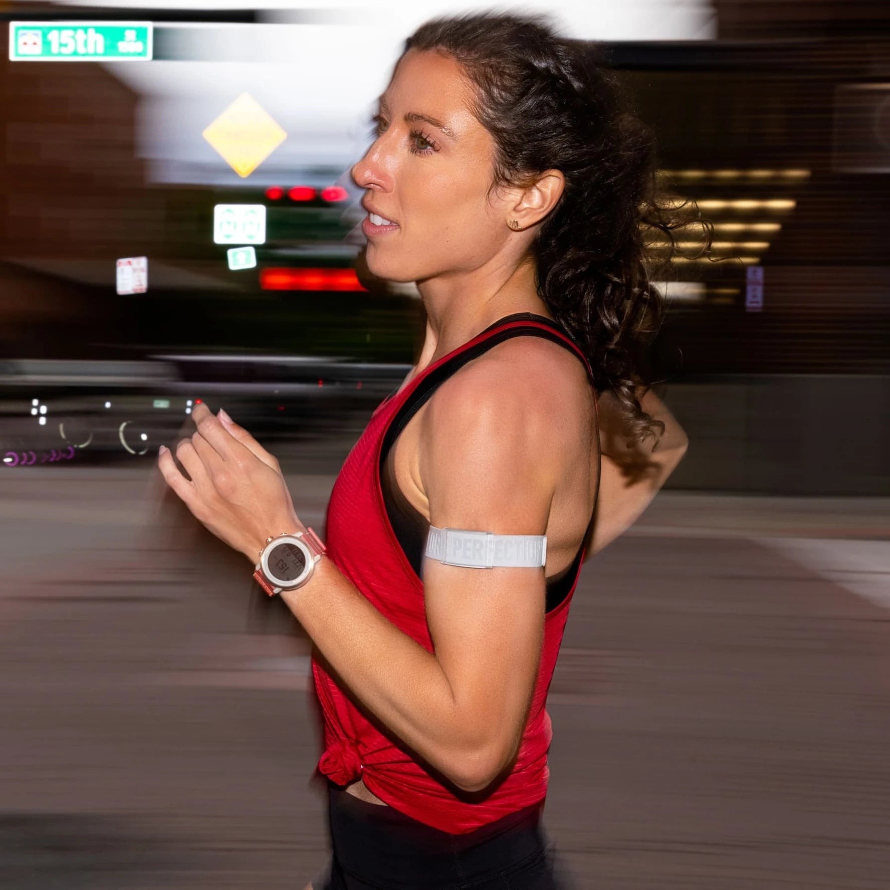 Woman running on a treadmill with a blurred background