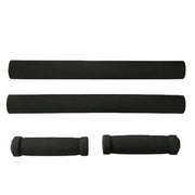 Four black foam handlebar grips shown on a plain white background, including two long straight grips and two shorter wrapped grips.