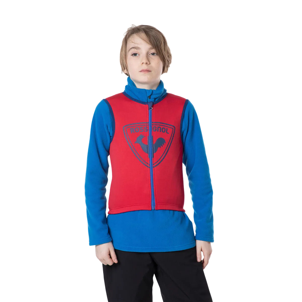 Person wearing a red and blue jacket with a logo on a white background