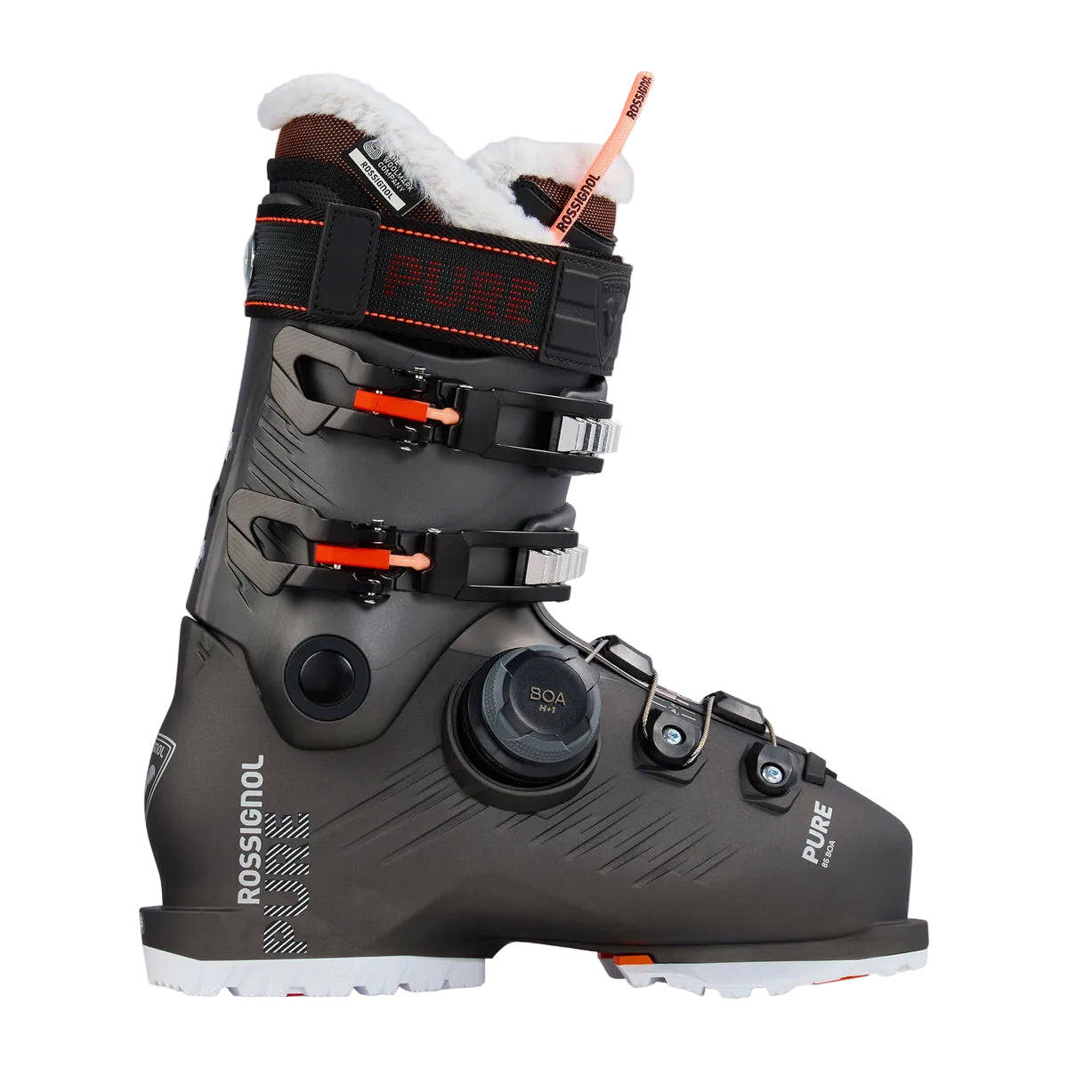 A Rossignol Pure ski boot in dark gray and black with white fur lining, orange accents, and a BOA dial closure system, shown against a light gray studio background.