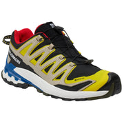 Multicolored running shoe with visible brand logo on a white background