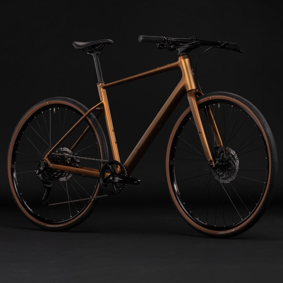 Bicicleta urbana CUBE NULANE ONE – Caramelo metálico / Marrón 2027