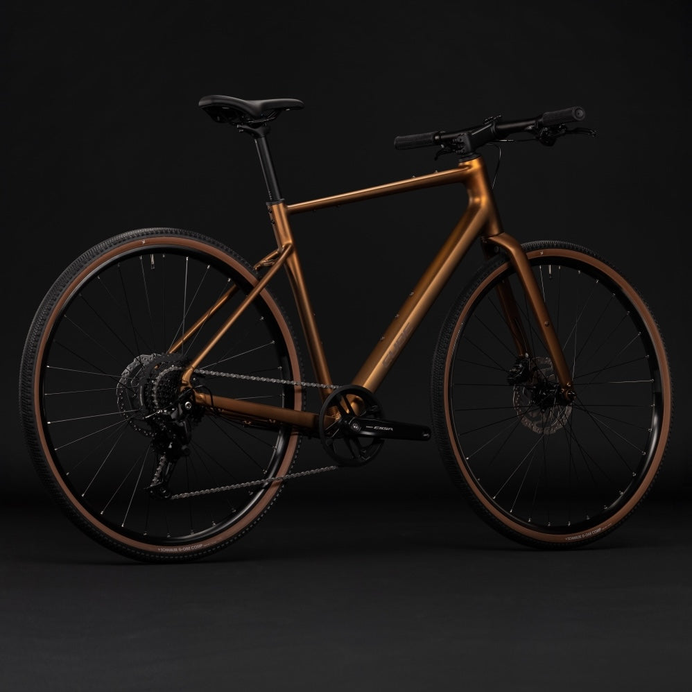 Bicicleta urbana CUBE NULANE ONE – Caramelo metálico / Marrón 2027
