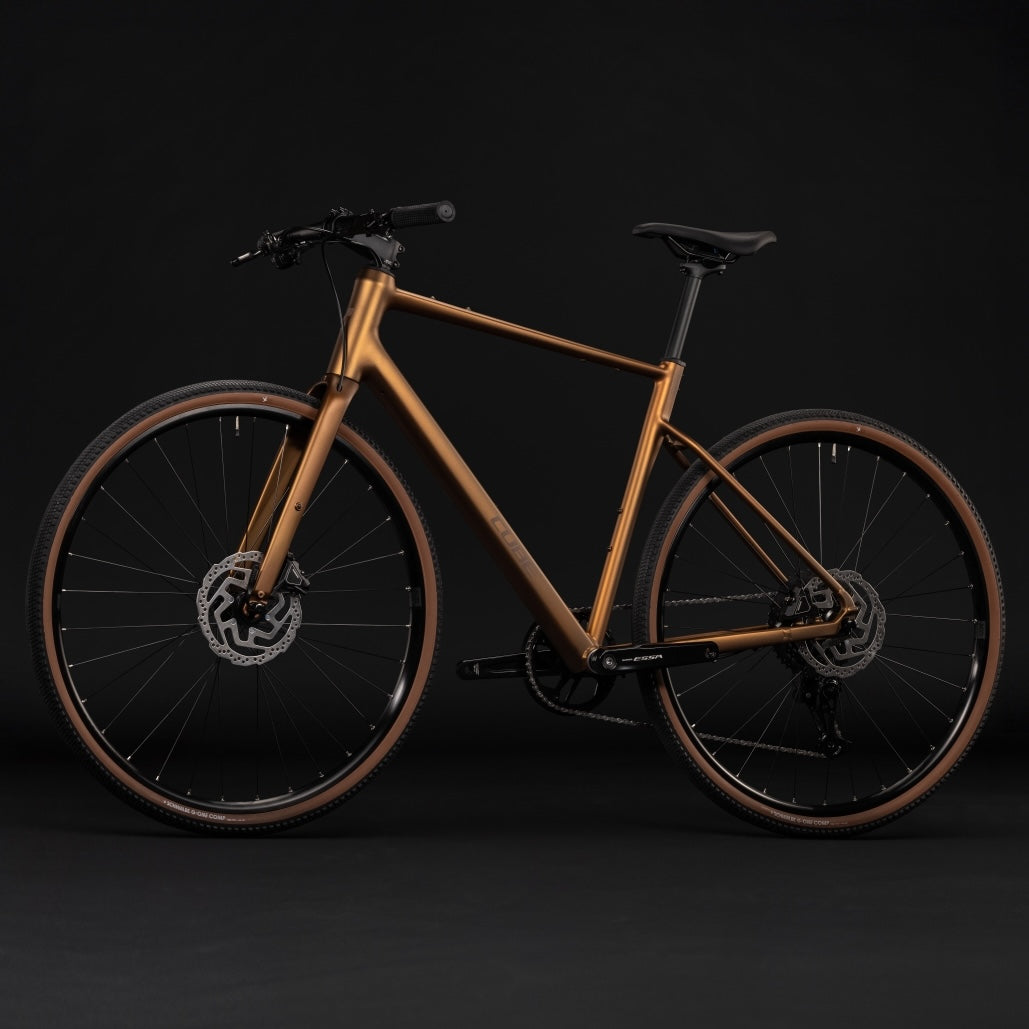 Bicicleta urbana CUBE NULANE ONE – Caramelo metálico / Marrón 2027