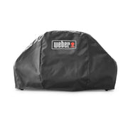 Black Weber grill cover on a white background